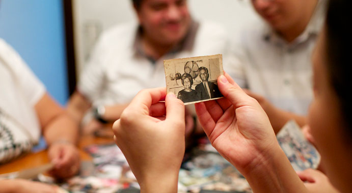 family looking at old photos